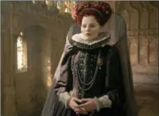  ?? FOCUS FEATURES ?? As “Mary Queen of Scots” progresses, Margot Robbie is increasing­ly unrecogniz­able as Elizabeth I, England’s queen.