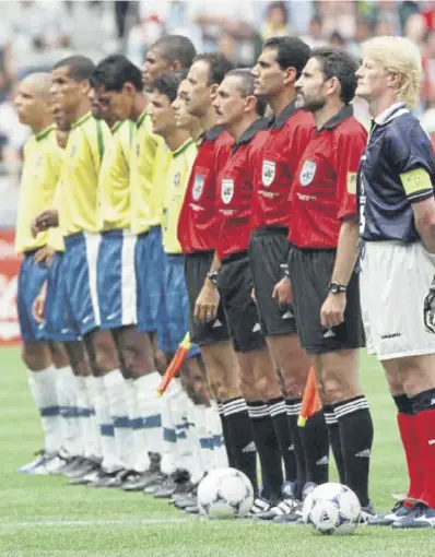  ?? ?? Steve Clarke playing for Scotland against Hungary in 1987, above left, and holding off Liverpool’s Karl Heinze Riedle while starring for Chelsea in 1997, left. But notable by his absence as Scotland line up at the 1998 World Cup, main