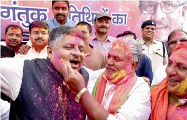  ?? — PTI ?? Union minister Ravi Shankar Prasad celebrates Holi with BJP and RSS leaders in Patna on Friday.