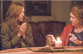  ?? A24 ?? Toni Collette (left) and Ann Dowd face some scary truths from the past in “Hereditary.”