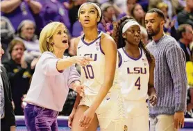  ?? Derick Hingle/Associated Press ?? LSU head coach Kim Mulkey talks with forward Angel Reese (10) during the second half against Georgia in Baton Rouge, La., on Feb. 2.