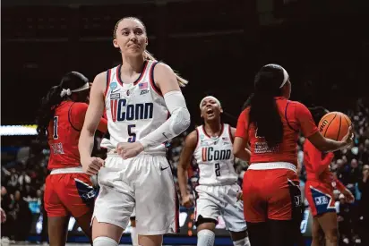  ?? Joe Buglewicz/Getty Images ?? UConn’s Paige Bueckers reacts against Jackson State during the first half on Saturday in Storrs.