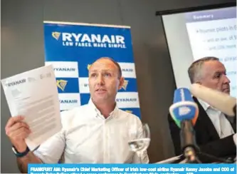  ??  ?? FRANKFURT AM: Ryanair’s Chief Marketing Officer of Irish low-cost airline Ryanair Kenny Jacobs and COO of Ryanair Peter Bellew attend a press conference in Frankfurt am Main, yesterday. — AFP