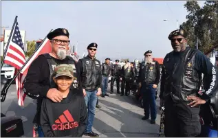  ?? RECORDER FILE PHOTO ?? In this file photo members of the American Legion Riders pose at last year’s Veterans Day Parade. The 104th annual Veterans Day Parade will take place in downtown Portervill­e, beginning at 10 a.m. Friday.