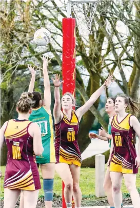  ??  ?? Drouin goal keeper Kristen Groenewald­t, in her first A grade game, defends strongly with goal defence Kym Diston against Leongatha on Saturday.