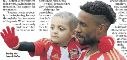  ??  ?? Bradley with Jermain Defoe.