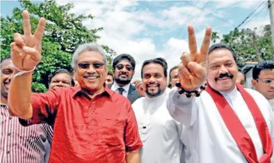  ??  ?? V FOR VICTORY: The Rajapaksas return in full swing to reclaim the lost throne and a paradise again