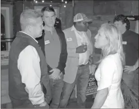  ??  ?? Above: Sheriff- elect Dave Roberson (from left), Floyd GOP Chair Luke Martin, Jamie Palmer and Marjorie Taylor Greene wait on election results at Rome City Brewing Co. during the Floyd GOP’S watch party on Tuesday night. Right:
State Rep. Eddie Lumsden ( left), R- Armuchee, and Barry Hurley chat during the Republican Party’s get together.