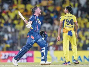  ?? (AFP) (Gaikwad ?? Lucknow Super Giants’ Marcus Stoinis (left) celebrates after his team’s win at the end of the Indian Premier League match against Chennai Super Kings in Chennai yesterday.