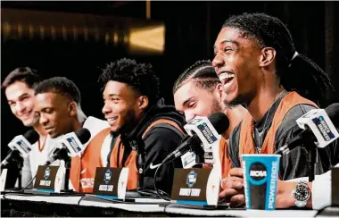  ?? Brett Coomer/Staff photograph­er ?? Marcus Carr, right, and Texas were still smiling Saturday, a day after beating Xavier to reach the program’s first regional final in 15 years. The Longhorns face Miami on Sunday for a trip to the Final Four in Houston.