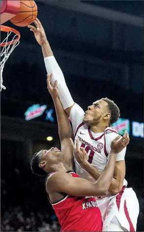  ?? NWA Democrat-Gazette/BEN GOFF ?? Arkansas sophomore forward Daniel Gafford (right) said the Razorbacks are looking to put last week’s 78-77 loss to Western Kentucky behind them entering today’s game against Texas-San Antonio at Verizon Arena in North Little Rock. “The main thing we’re trying to do is get that taste out of our mouths,” he said. “It was a tough loss.”