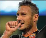  ??  ?? Sign: Roma captain Francesco Totti