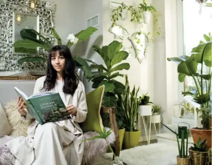  ?? CARLOS OSORIO/TORONTO STAR ?? Erin Kobayashi’s condo started transition­ing into an urban jungle when she brought her outdoor plants inside for the winter.