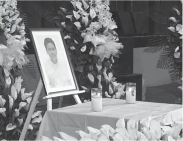  ?? (Louie France Arbiso, USTP intern) ?? An altar was placed in front, with a photo of the late USTP President Ricardo Rotoras, where flowers and letters will be offered during the tribute conducted inside the university gymnasium on Monday morning, December 4.