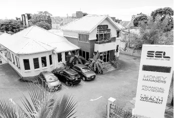  ?? ?? Stocks & Securities Limited’s headquarte­rs on Hope Road, St Andrew.