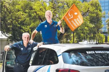  ??  ?? NEW BROOM: Mike Turtur (left) is handing the reins to Stuart O'Grady.
Picture: TRICIA WATKINSON