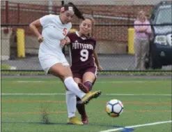  ?? AUSTIN HERTZOG - DIGITAL FIRST MEDIA ?? Perkiomen Valley’s Alison Devers (5) clears the ball as Pottsgrove’s Anna Crater pressures during Tuesday’s PAC crossover game. Devers scored the lone goal in PV’s 1-0 win.