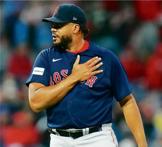  ?? MITCHELL LEFF/GETTY IMAGES ?? Kenley Jansen got the heart pumping in the ninth, but he got out of a jam and picked up career save 398, seventh all time.