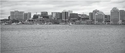  ?? RYAN TAPLIN/SALTWIRE NETWORK ?? The Halifax skyline is seen from King's Wharf in Dartmouth, N.S.