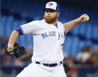  ?? NATHAN DENETTE, THE CANADIAN PRESS ?? Blue Jays starter Brett Anderson (3-4) gave up seven hits, two walks and eight runs. He started trending on Twitter after a video clip appeared to show him tearing his cap in frustratio­n while sitting in the dugout.