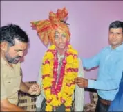  ?? HT PHOTO ?? People welcome Vishvendra Singh of Bharatpur, who scored 99.40% in Class 12 of RBSE on Thursday.