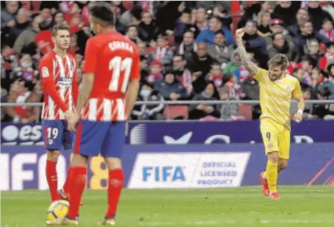  ?? EFE ?? Portu celebra el gol del Gerona ante la desolación de los jugadores del Atlético