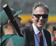  ?? Carlos Avila Gonzalez / The Chronicle ?? While frontoffic­e mainstay Billy Beane ( right) may depart from the A’s this offseason, it’s far from being a certainty.