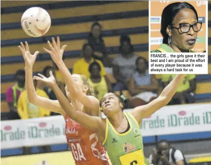  ?? (Photo: Garfield Robinson) ?? In this 2018 file photo, England’s Helen Housby (left) and Jamaica’s Adean Thomas vie for the ball during a netball encounter between the teams at National Indoor Sports Centre in Jamaica. FRANCIS... the girls gave it their best and I am proud of the effort of every player because it was always a hard task for us