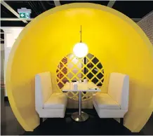  ??  ?? Yellow and white decor adorns the new 50-seat OEB Breakfast Co. outlet, a bright inviting space at 222 5th Ave. S.W.