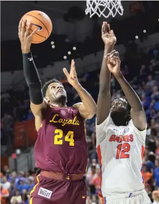  ??  ?? Loyola forward Aundre Jackson led the way with 23 points in Loyola’s huge upset. | RON IRBY/ AP