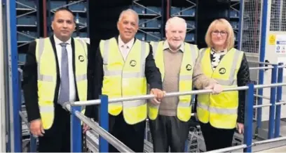  ??  ?? ●●Rochdale Council Leader Allen Brett on a trip to Kingsway Distributi­on Park with ward Councillor Shakil Ahmed and Councillor Daalat Ali