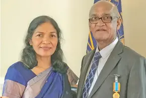  ??  ?? Dilip Khatri and wife, Bharti Khatri after receiving his 50th Anniversar­y Independen­ce Commemorat­ive Medal on November 25, 2020.