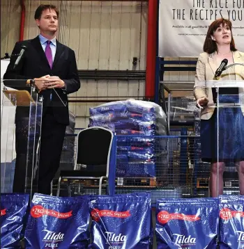  ??  ?? Bizarre gathering: Nick Clegg, Nicky Morgan and David Miliband at the Tilda rice warehouse in Essex yesterday