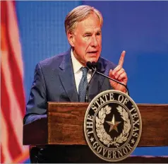  ?? AUSTIN AMERICAN-STATESMAN/TNS ?? Gov. Greg Abbott signed into law in May the Texas legislatio­n that prohibits abortions once a heartbeat can be detected in a fetus, which is typically by the sixth week.