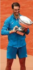  ?? Photo: Getty ?? CHAMP: Rafael Nadal with the French Open trophy.