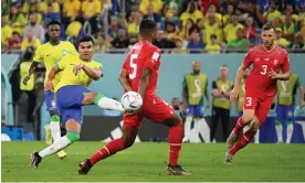  ?? Matthias Hangst/Getty Images ?? Casemiro arrows his half-volley into the net to secure victory for Brazil. Photograph: