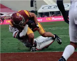  ?? GARY A. VASQUEZ/USA TODAY SPORTS ?? USC wide receiver Drake London runs the ball in for a touchdown against Arizona during the first half Saturday.