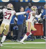  ?? MARK J. TERRILL — THE ASSOCIATED PRESS ?? Ambry Thomas, right, and 49ers teammate Dontae Johnson celebrate Thomas’ game-ending intercepti­on.