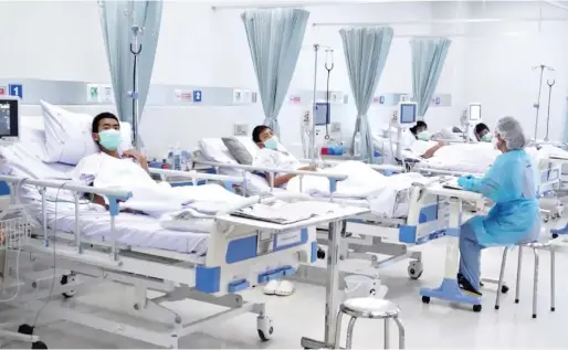  ?? Reuters ?? A screen grab shows boys rescued from the Thai cave wearing masks and resting in a hospital in Chiang Rai, Thailand, from a handout video. —