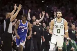  ?? AP photo ?? The Celtics’ Jayson Tatum gestures after scoring during the second half of Boston’s 9586 win over the Philadelph­ia 76ers in Game 6 of their Eastern Conference semifinals series Thursday.