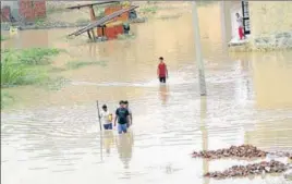  ?? HT FILE ?? In July 2019, agricultur­al fields spread over 30,000 acre in Patiala and Sangrur got submerged in Ghaggar water and villagers residing in the vicinity had to shift to safer places.