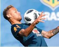  ?? — AFP ?? Star striker Neymar insisted he is determined to lead Brazil to success at this year’s World Cup.