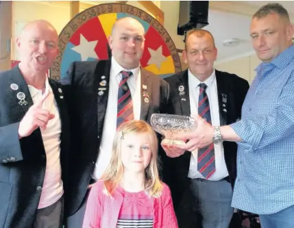  ??  ?? Top three The winning triple at Cambuslang Bowling Club’s Hoad Triples are (from left) Alex Hay, Richie McInall junior, president Richie Mcinall senior, sponsor Stuart Hoad and his daughter Caitlin