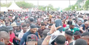  ?? . PHOTO: AYODELE ADENIRAN ?? Group of protesters in Lagos, yesterday