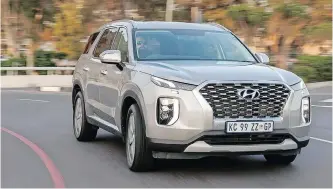  ??  ?? THE Hyundai Palisade cruises long distances quietly and economical­ly.