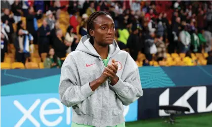  ?? Photograph: Elsa/Fifa/Getty Images ?? Ifeoma Onumonu of Nigeria applauds fans after her team's defeat on penalties against England in Brisbane.