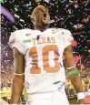  ?? MIKE BLAKE/REUTERS ?? Texas quarterbac­k Vince Young celebrates a 41-38 victory over USC for the national championsh­ip at the 92nd Rose Bowl game on Jan. 4, 2006.