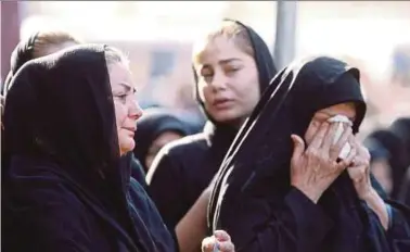  ?? AFP PIC ?? Iranian women mourning at a public funeral yesterday for those killed in an attack on a military parade in the city of Ahvaz on Saturday.