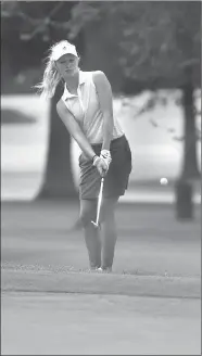  ?? Spencer Tirey/NWA Democrat-Gazette ?? Siloam Springs High School golfer Brinkley Beever chips onto the green on hole 1 at Springdale Country Club during the Springdale Har-Ber Wildcat Invitation­al on Aug. 3.