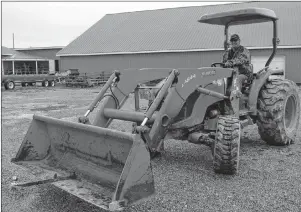  ?? JEREMY FRASER/CAPE BRETON POST ?? Gerry Apesteguy drives a tractor at the Cape Breton County Exhibition Grounds on Regent Street in North Sydney on Thursday. Plans are well underway for this year’s Cape Breton County Farmers Exhibition, which will take place Aug. 13-18.